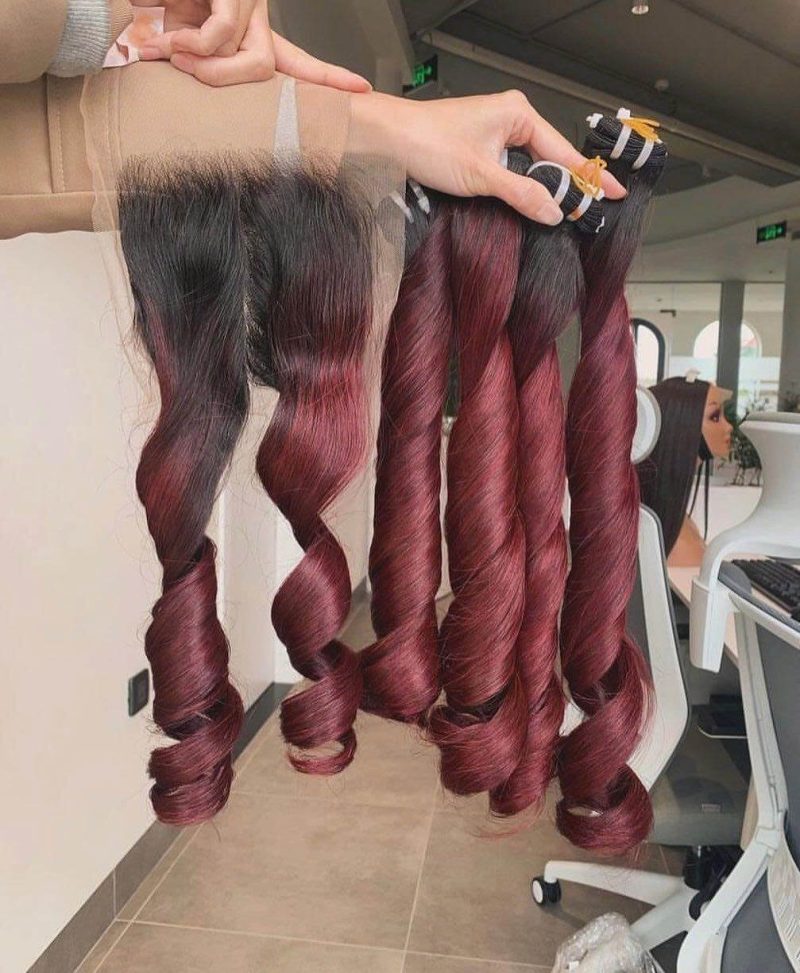 Bouncy curly hair bundles made from 100% raw Vietnamese human hair.