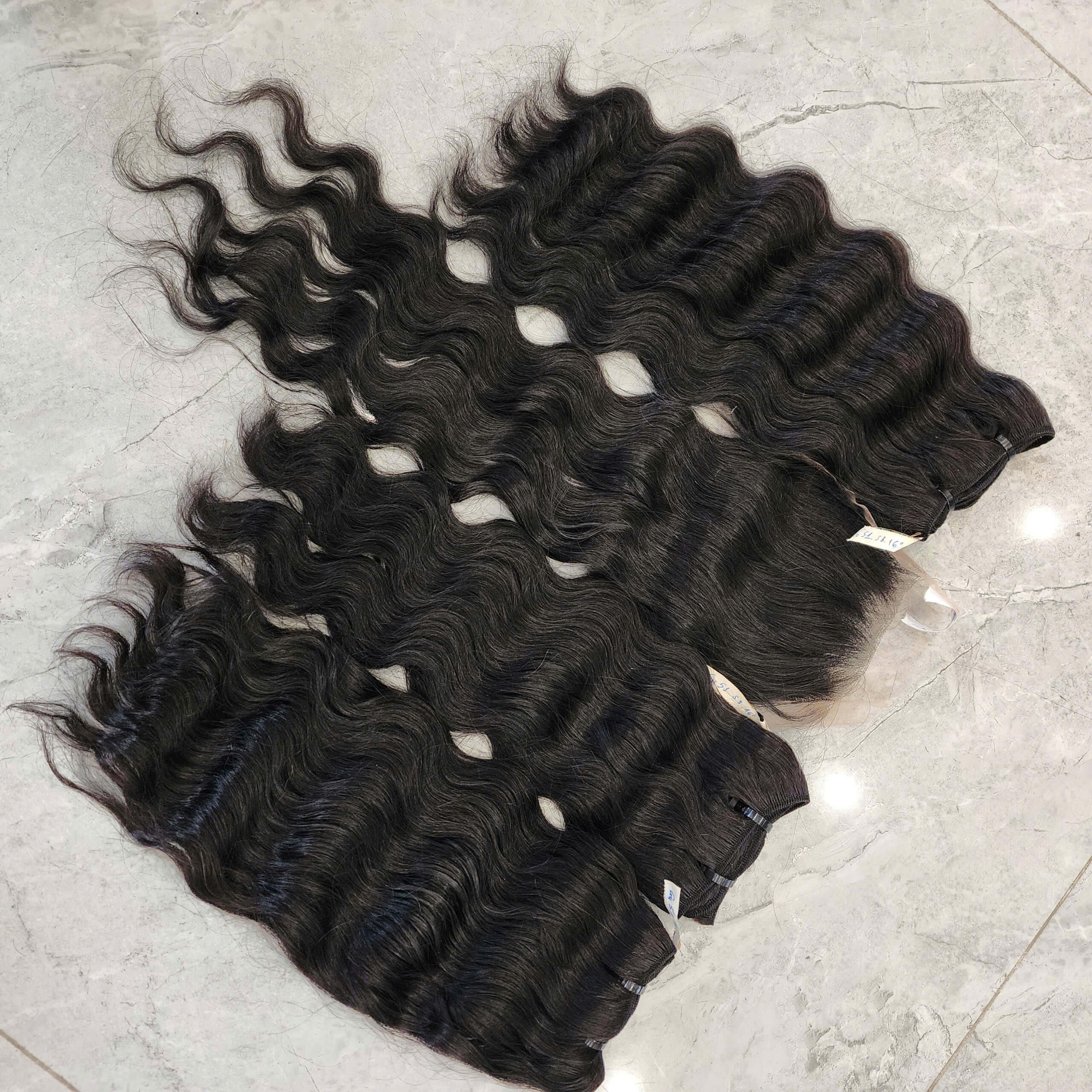 Raw Vietnamese Wavy Hair – Deep Wavy 3 Hair Bundles With Lace Closure 9 Raw Vietnamese Wavy Hair 3 Hair Bundles With Lace Closure 4X4 20 Inches