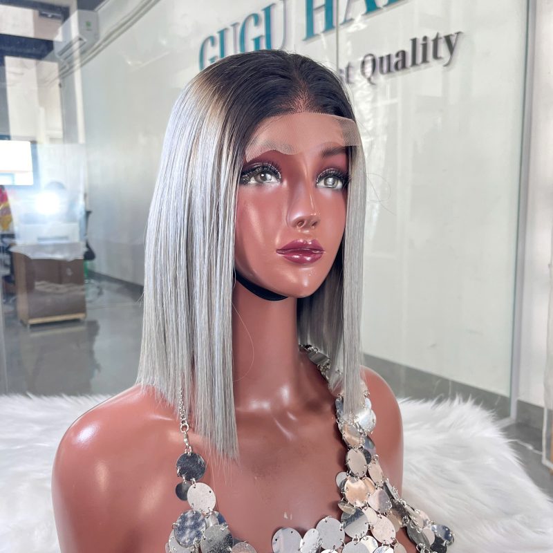 Stylish gray bob wig displayed indoors.