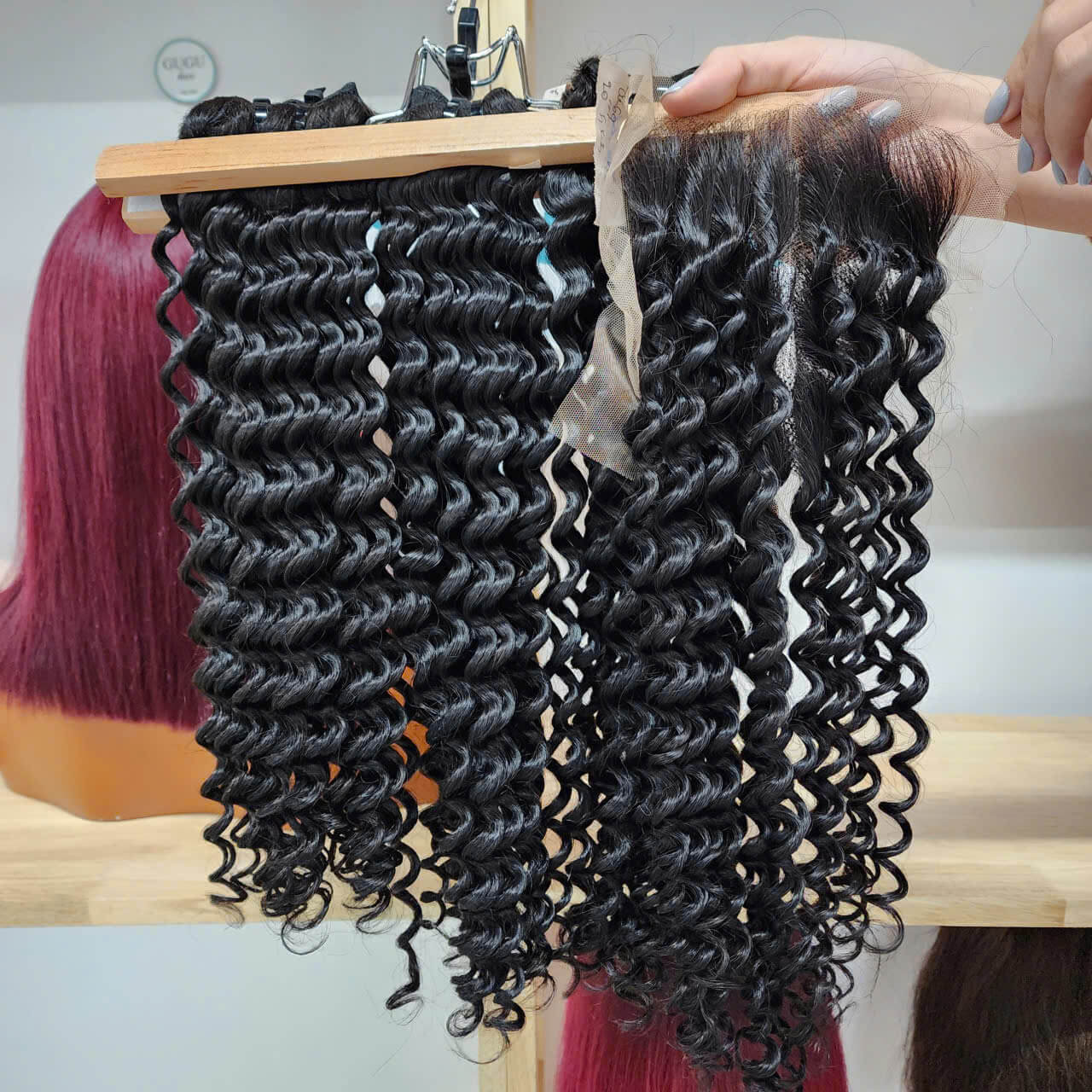 100% Vietnamese human hair bundle weft water curly extensions.