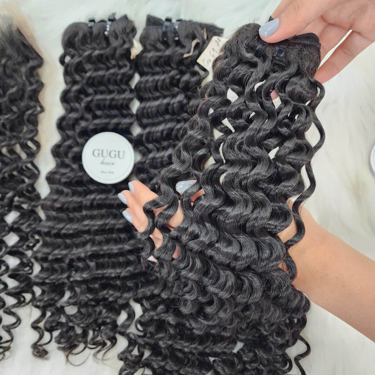 100% Vietnamese Human Hair Bundle Weft Water Curly Extensions 4 100% Vietnamese human hair bundle weft water curly extensions.