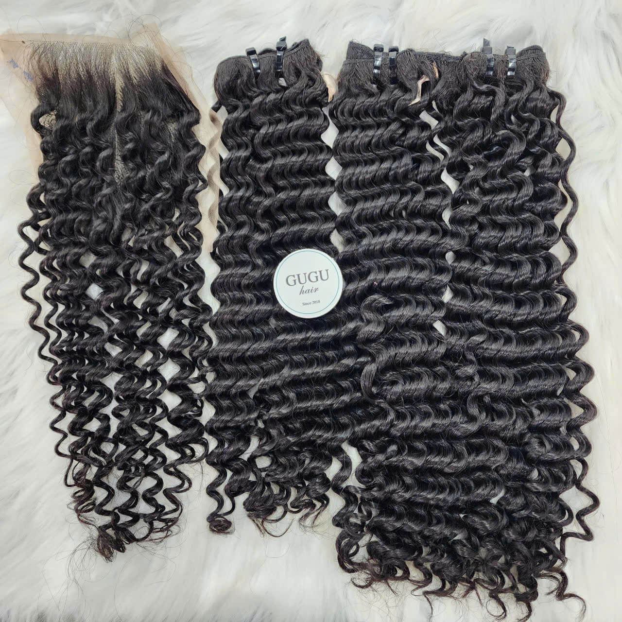 100% Vietnamese human hair bundle weft water curly extensions.