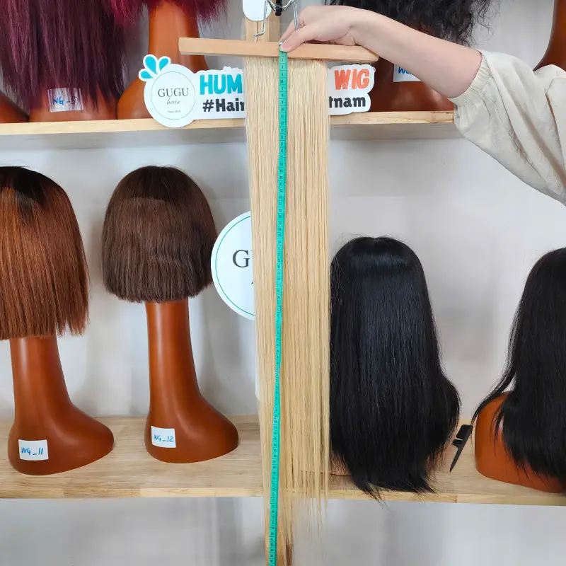 Vietnamese Hair Factory | Human Hair Manufacturer | GUGU HAIR 95 28 Inch Straight Blonde Closure showing full length and smooth texture